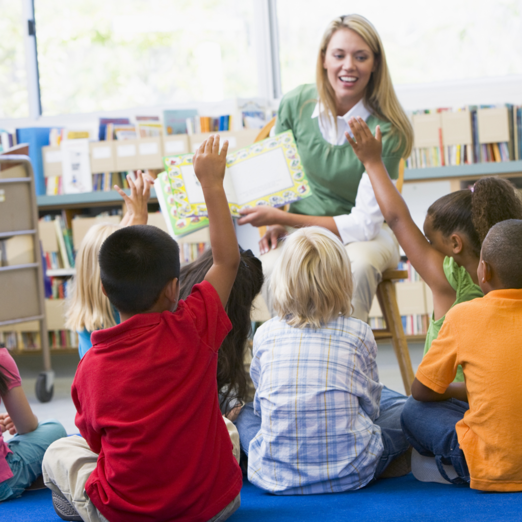 kindergarten teacher teaching phonics